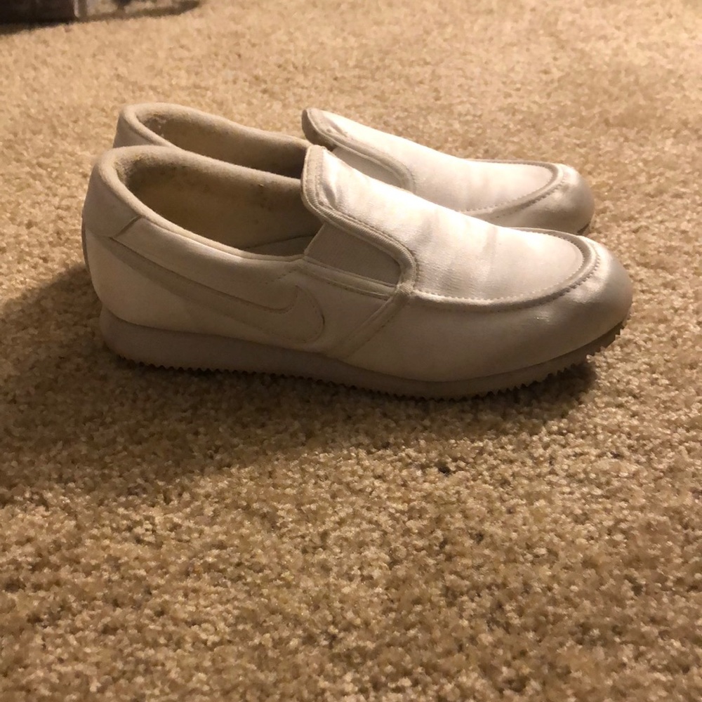 White Nike slip ons Size 8